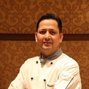 This image has an empty alt attribute; its file name is Master-Patissier-Chef-Surendra-Negi-Taj-Palace-New-Delhi-scaled-e1639569179204-1024x1024.jpg