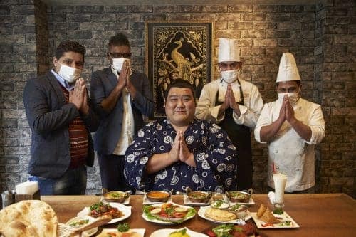 Yoshinori Tashiro enjoying Indian food in Japan -JNTO