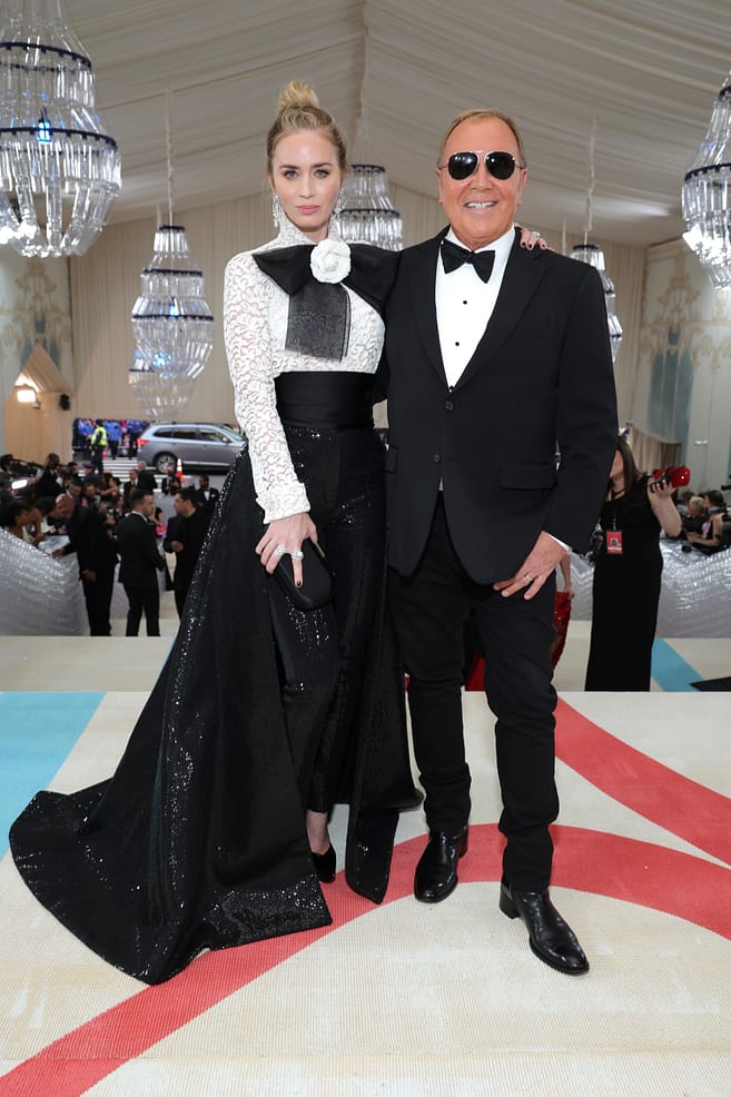 Emily Blunt wearing Wearing Michael Kors Collection with Michael Kors attend The 2023 Met Gala Celebrating "Karl Lagerfeld: A Line Of Beauty" at The Metropolitan Museum of Art (Photo by Kevin Mazur/MG23/Getty Images for The Met Museum/Vogue)